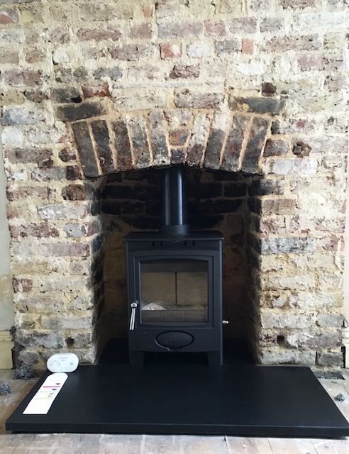 Building works of opening up fireplace