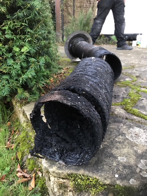 a flexible flue liner that was removed from burning wet coal _ wood which caused a chimney fire